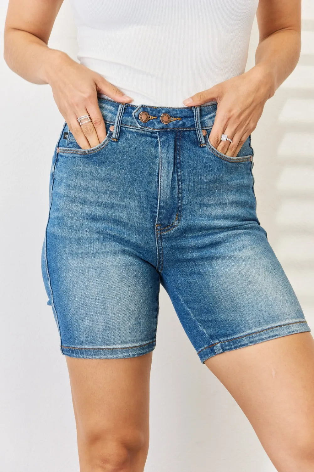 Judy Blue denim Bermuda shorts with tummy control and double button waist, full size, in classic blue denim.