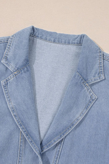Medium-length denim babydoll dress with lapel collar and cap sleeves, stylish and casual by Trendsi.