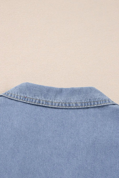Medium-length denim babydoll dress with lapel neckline and cap sleeves from Trendsi, shown on a model.
