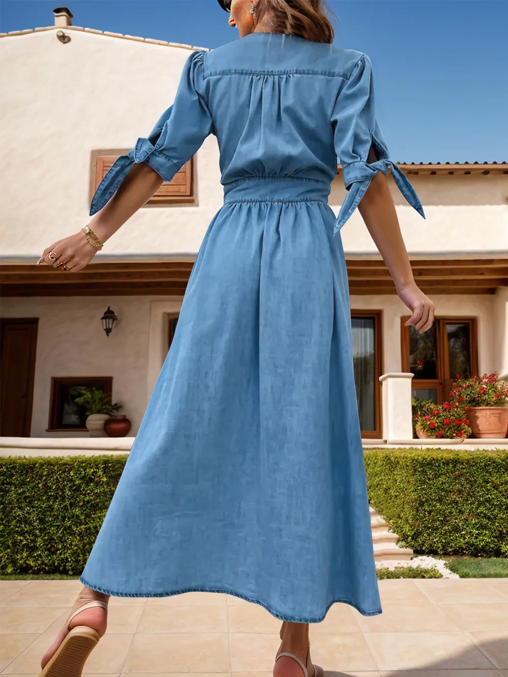 Medium-length denim dress from Trendsi featuring a plunge neckline, button-up front, and half sleeves, casual and stylish for everyday wear.