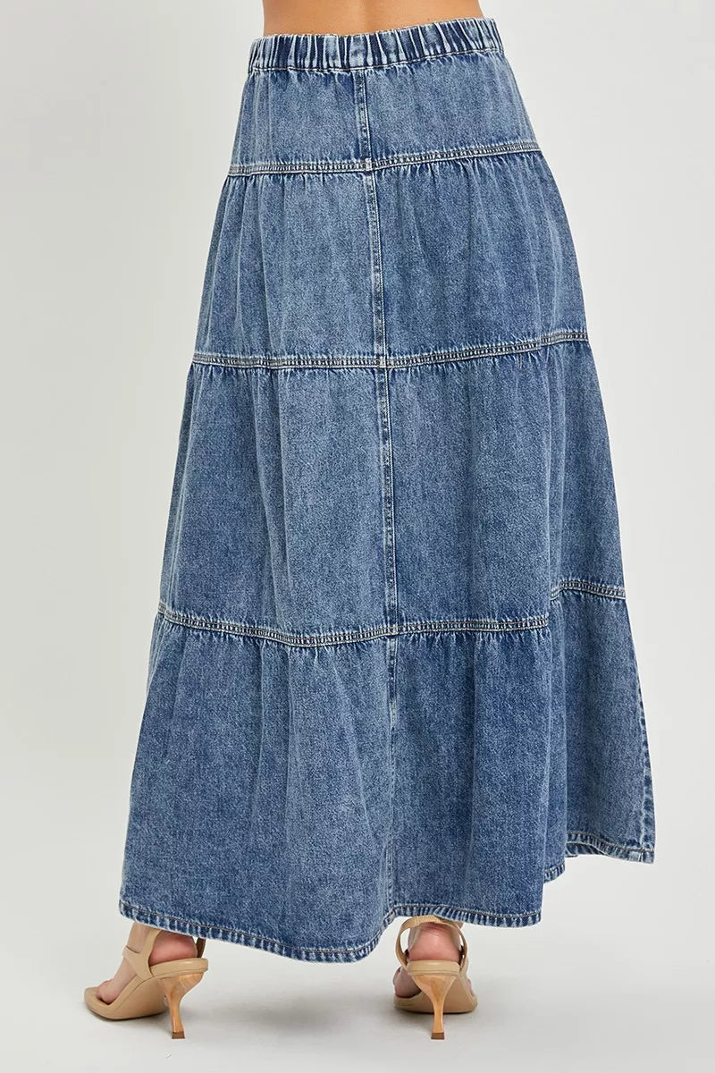 Risen high rise ruffle long skirt by Trendsi, featuring a flowing silhouette with layered ruffles and a sleek waistband.
