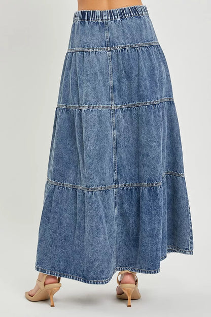 Risen high rise ruffle long skirt by Trendsi, featuring a flowing silhouette with layered ruffles and a sleek waistband.