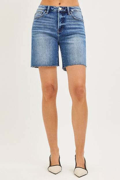 Medium pair of RISEN Tummy Control High Rise Raw Cut Hem Jeans from Trendsi, featuring a fitted waist and distressed raw hem detail.