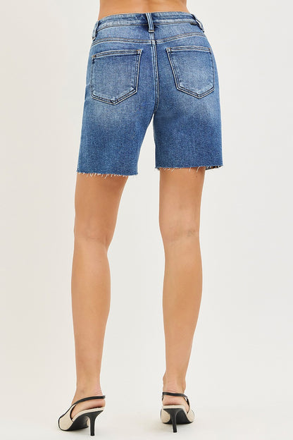 Medium-sized Risen Tummy Control high-rise raw cut hem denim shorts by Trendsi, featuring a fitted waist and distressed hem detail.