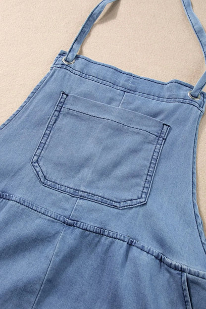 Square neck denim overalls with pockets from Trendsi, featuring a stylish fit and casual design on a model.