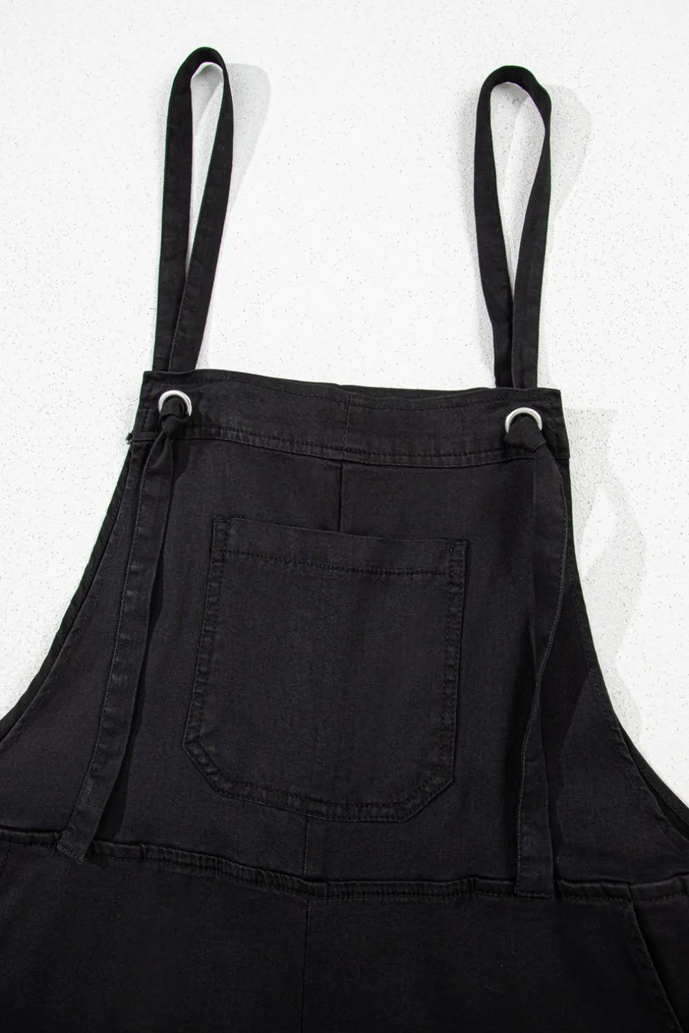 Square neck denim overalls with pockets from Trendsi, featuring a casual fit and classic blue denim fabric.