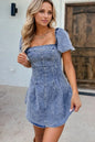 Trendsi denim dress with square neckline, puff sleeves, and tie-back design, styled for casual or semi-formal wear.