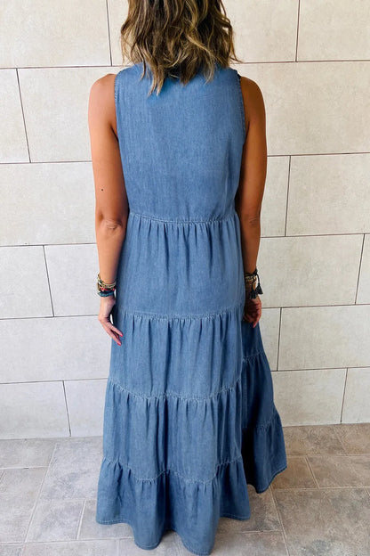 Medium-length tie neck tiered maxi denim dress by Trendsi featuring a stylish design with a flowing tiered skirt.