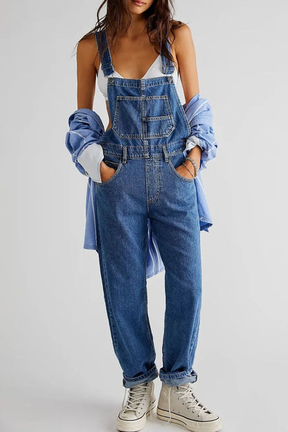 Medium blue denim overalls with wide straps and a square neckline, featuring a casual, trendy fit from Trendsi.
