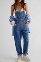 Medium blue denim overalls with wide straps and a square neckline, featuring a casual, trendy fit from Trendsi.