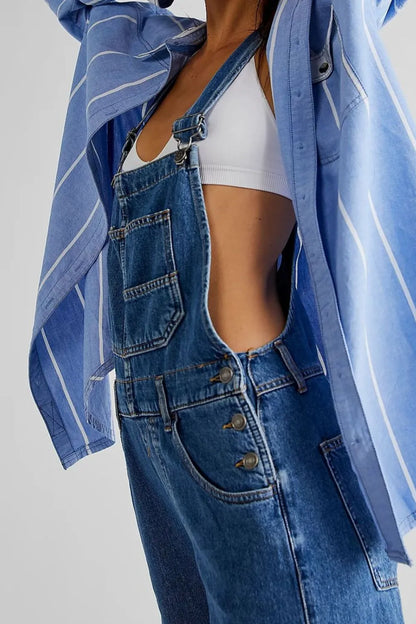 Medium shot of Trendsi wide strap square neck denim overalls hanging on a display mannequin.