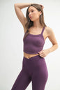 Merlot-colored MONO B seamless solid cami top by Trendsi, fitted and smooth fabric, close-up of neckline and straps.