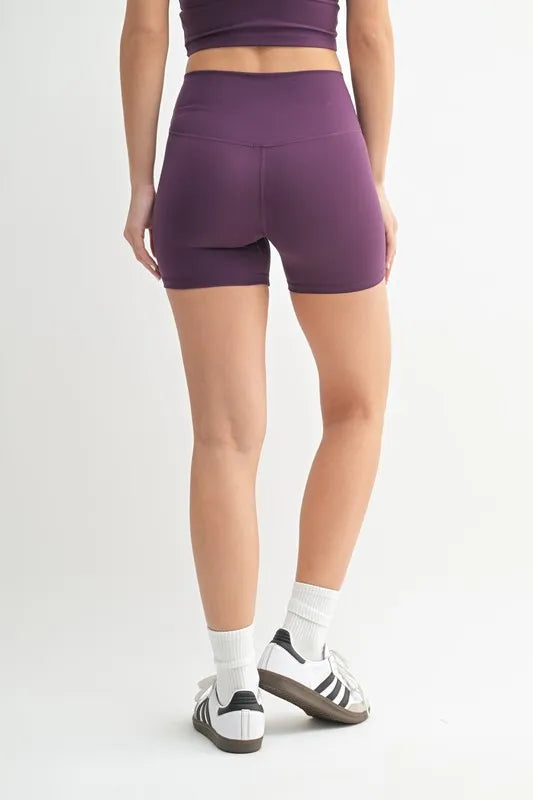 Light pink MONO B Venice Cloud Light Contour Biker Shorts by Trendsi, featuring a comfortable stretch fit and stylish design.