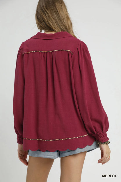 Plus size Umgee linen blouse with scallop hem and contrast trim, featuring a relaxed fit and stylish design.