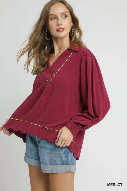 Plus size Umgee linen blouse with scallop hem and contrast trim, featuring a relaxed fit and stylish design.