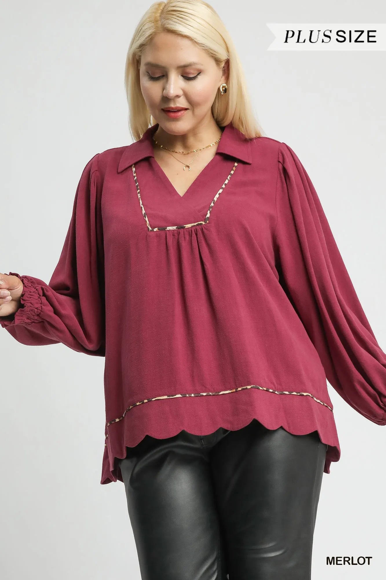 Plus size Umgee linen blouse with scallop hem and contrast trim, featuring a relaxed fit and stylish design for casual wear.