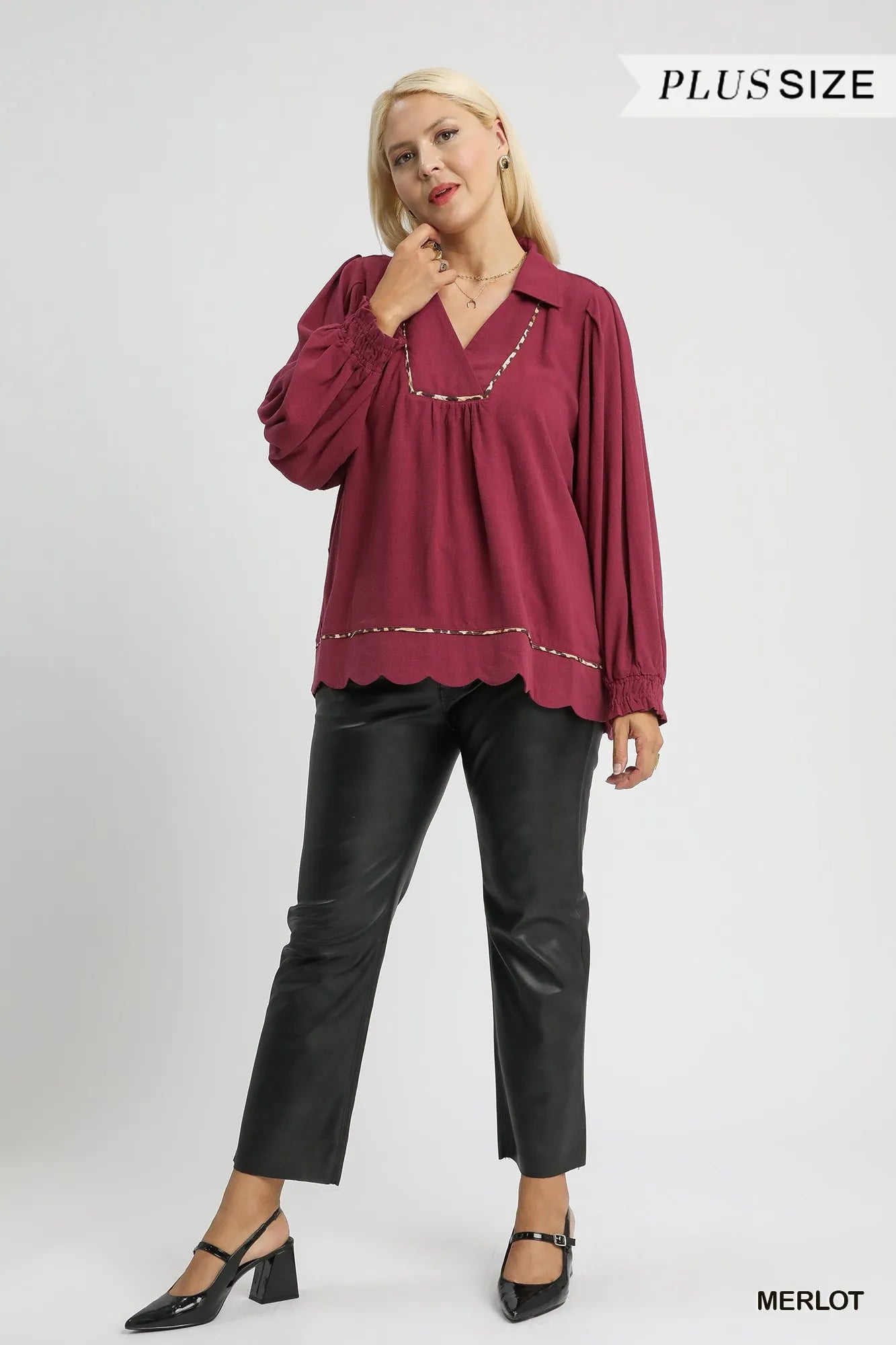 Plus size Umgee linen blouse with scallop hem and contrast trim, featuring a relaxed fit and stylish design.