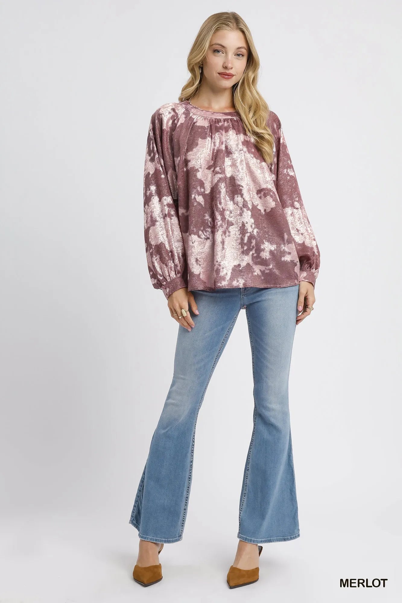 Metallic fabric blouse with balloon sleeves by Umgee, featuring a stylish, shiny design and relaxed fit in a trendy style.