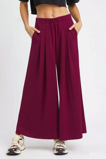 Umgee wide leg pants in merlot with pockets, featuring a relaxed fit and casual style for comfortable everyday wear.