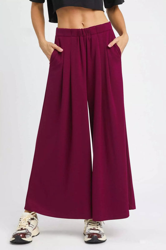 Umgee wide leg pants in merlot with pockets, featuring a relaxed fit and casual style for comfortable everyday wear.