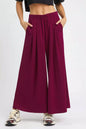 Umgee wide leg pants in merlot with pockets, featuring a relaxed fit and casual style for comfortable everyday wear.