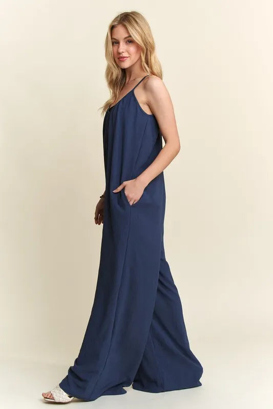 Midnight blue ADORA wide leg casual cami jumpsuit by Trendsi, featuring a relaxed fit and sleeveless design.
