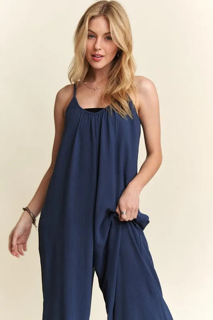 Midnight blue ADORA wide-leg casual cami jumpsuit by Trendsi, featuring a sleeveless design and relaxed fit.