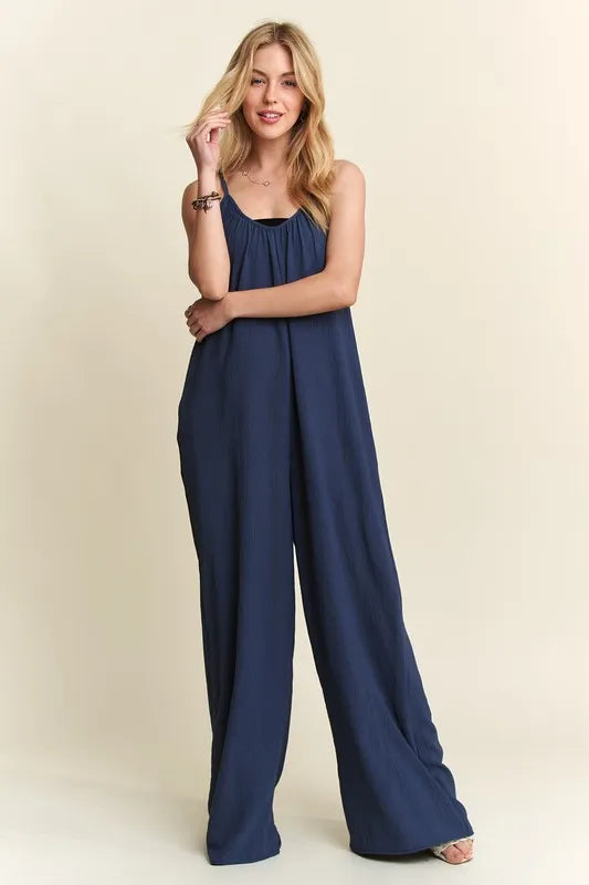 Midnight blue ADORA wide-leg casual cami jumpsuit by Trendsi, featuring a sleeveless design and relaxed fit.