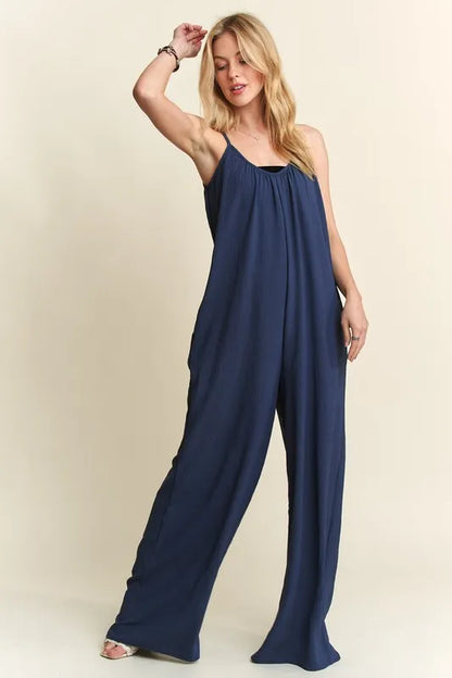 Midnight-blue ADORA wide-leg casual cami jumpsuit from Trendsi, featuring a relaxed fit and sleeveless design for comfortable style.