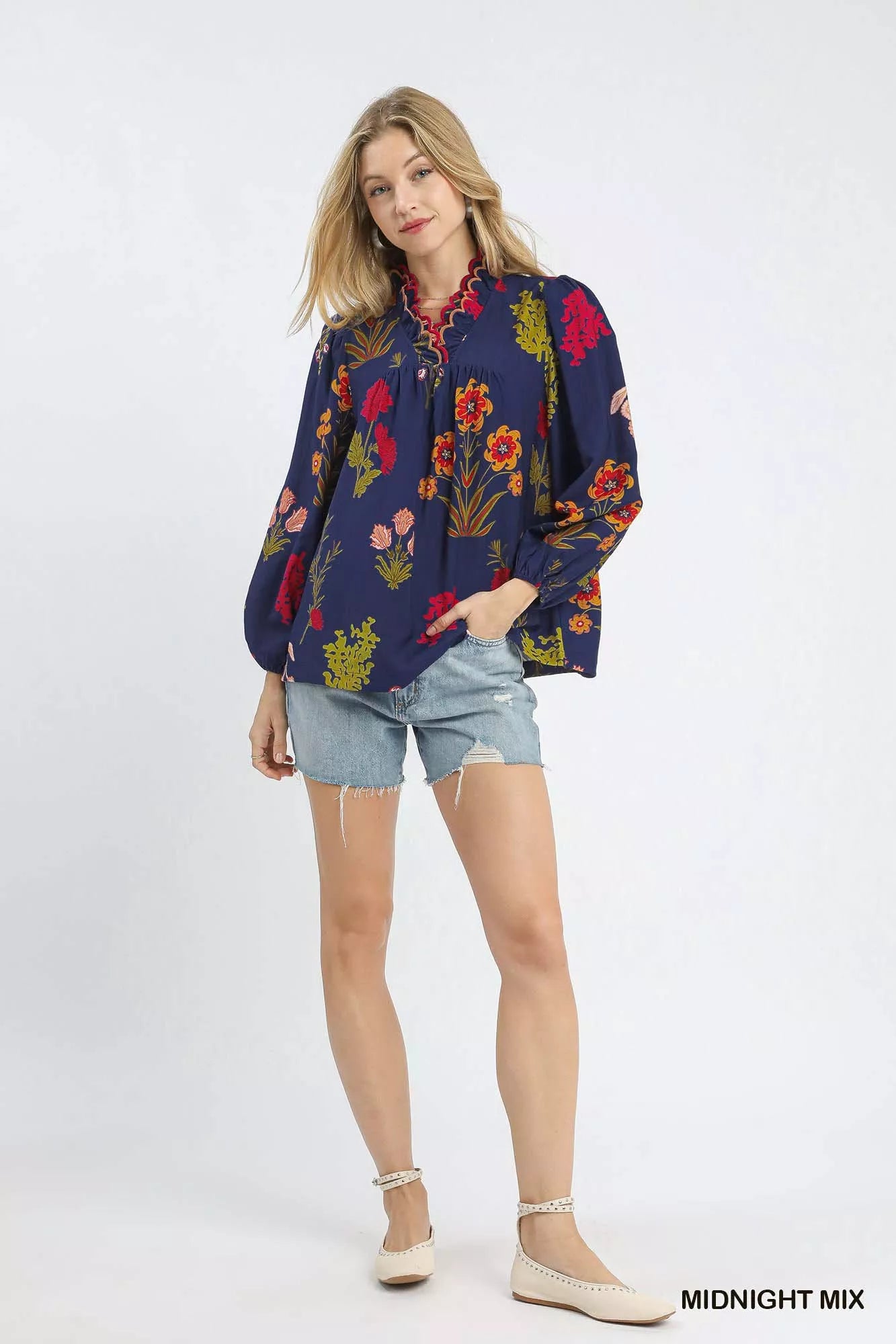 Umgee flower print blouse with scalloped neckline, in midnight mix, featuring a feminine and stylish design.