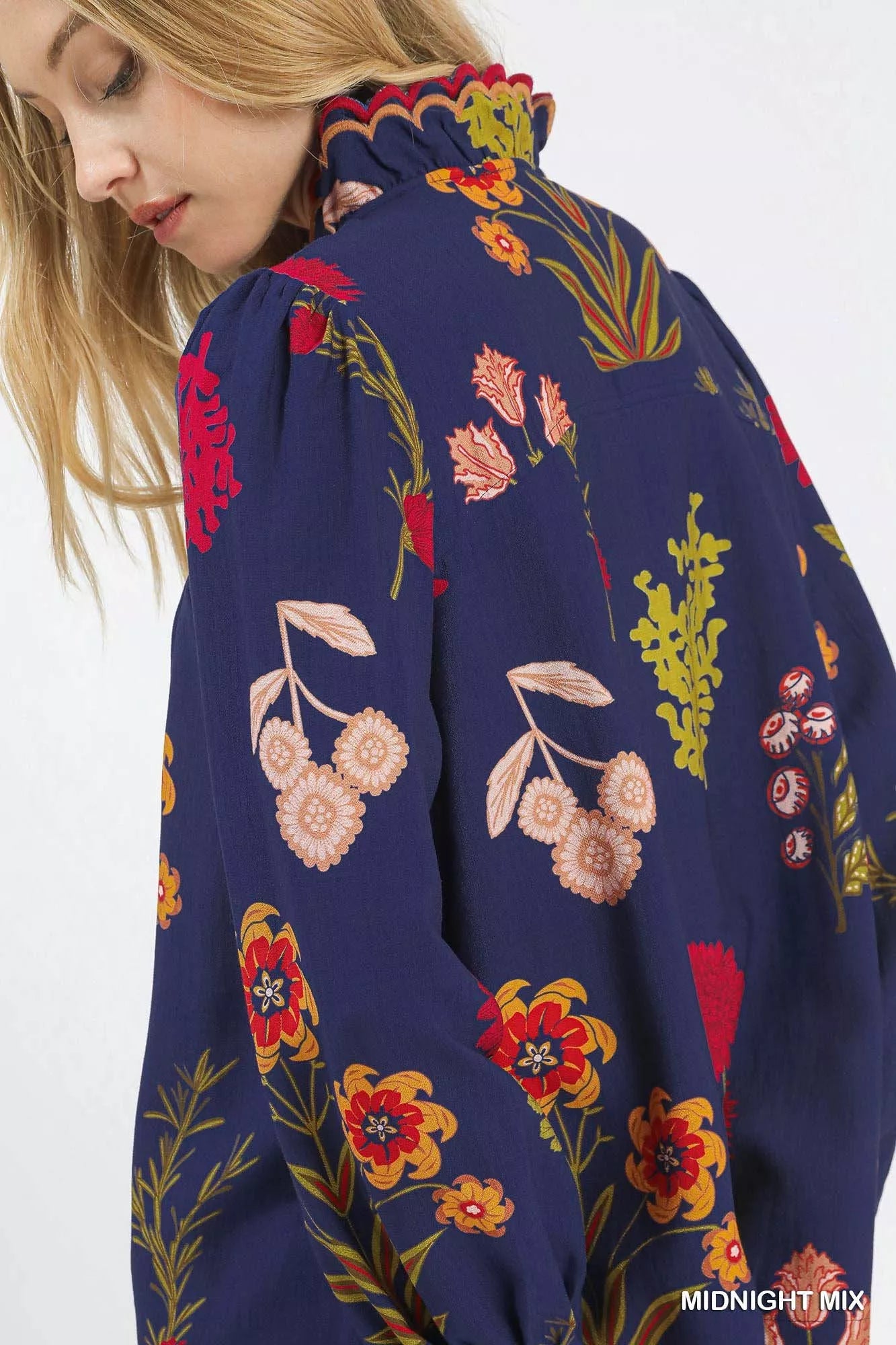 Midnight mix Umgee flower print blouse with scalloped neckline, featuring breezy, feminine design and lightweight fabric.