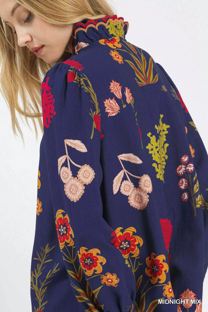 Midnight mix Umgee flower print blouse with scalloped neckline, featuring breezy, feminine design and lightweight fabric.