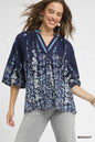 Plus size Umgee floral vine print blouse with balloon sleeves, showcasing a stylish full-size women's fashion top.