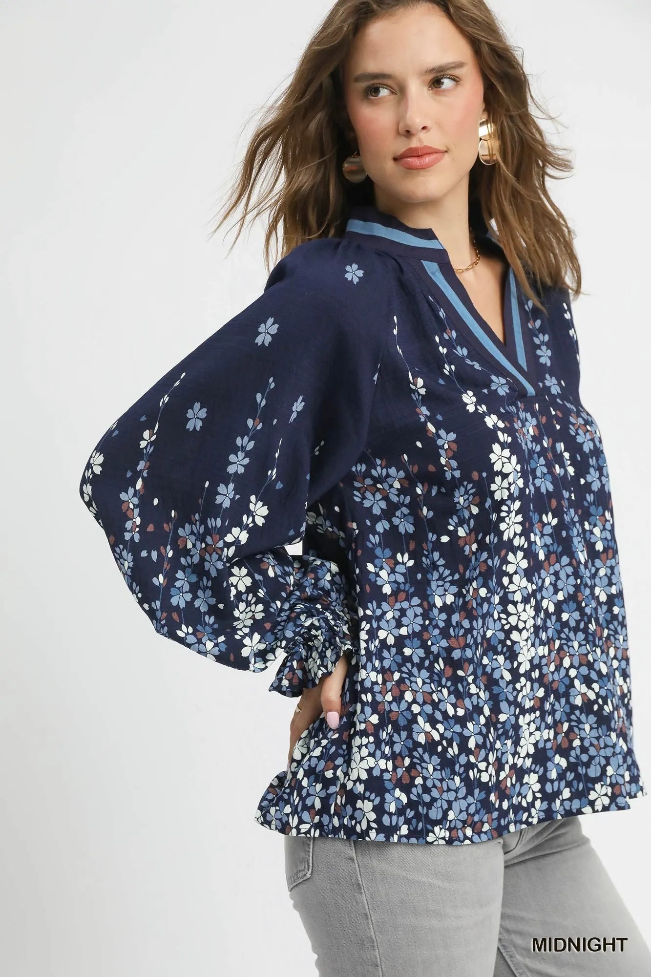 Plus size Umgee floral vine print blouse with balloon sleeves, stylish full-size women's top by Trendsi.