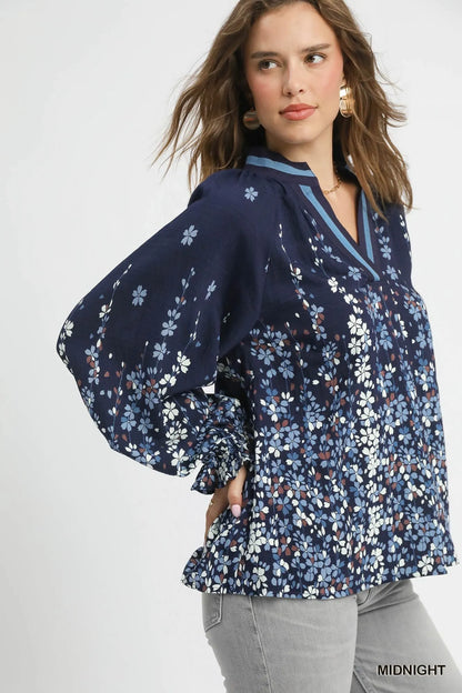 Plus size Umgee floral vine print blouse with balloon sleeves, stylish full-size women's top by Trendsi.