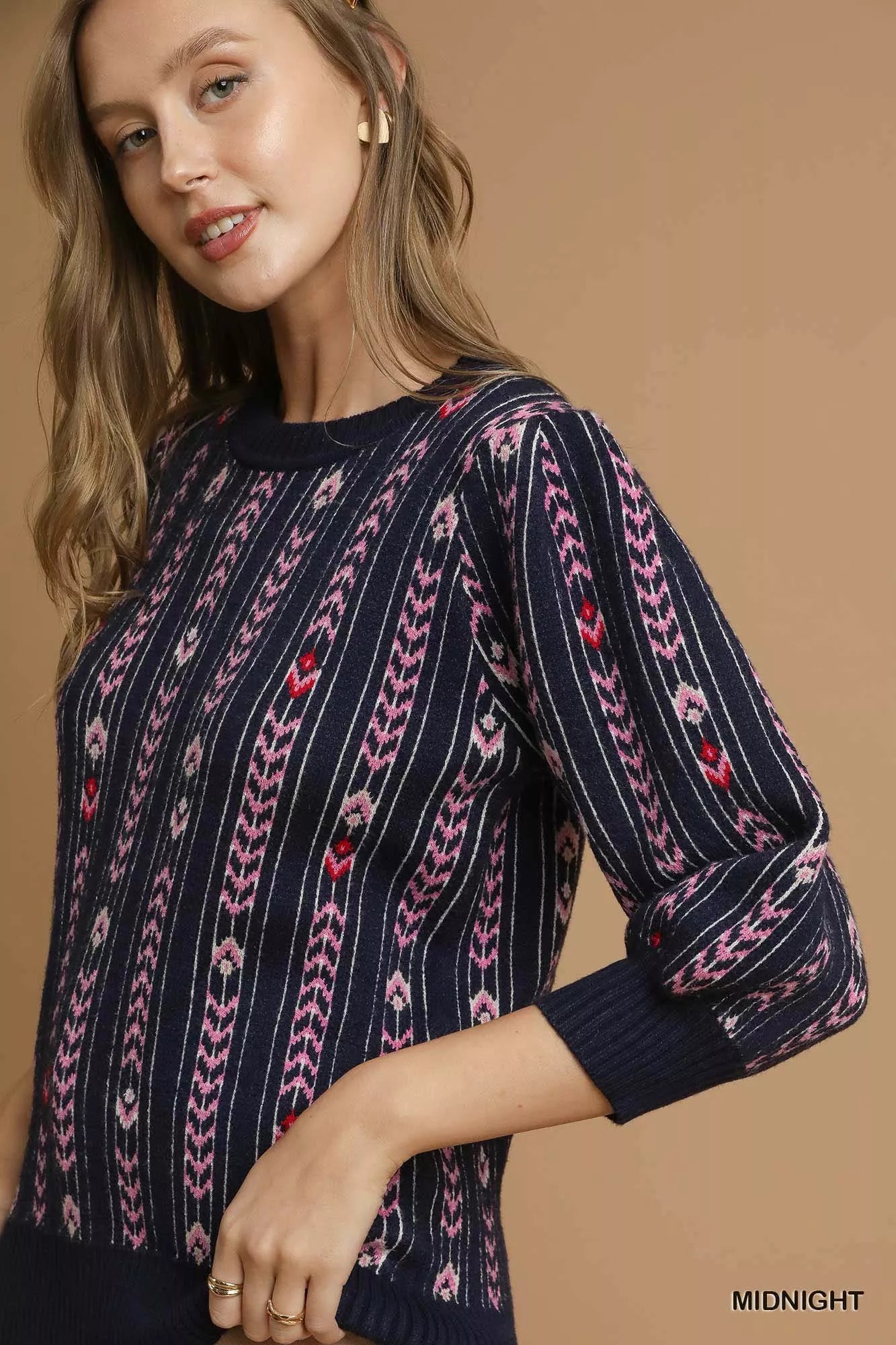 Midnight blue Umgee Jacquard Knit Puff Sleeve Sweater with intricate pattern and cozy fit, styled for a casual look.