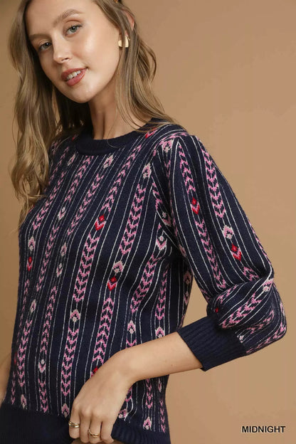 Midnight blue Umgee Jacquard Knit Puff Sleeve Sweater with intricate pattern and cozy fit, styled for a casual look.