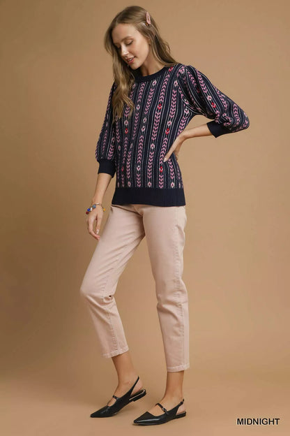 Midnight blue Umgee Jacquard Knit Puff Sleeve Sweater with intricate pattern and cozy knit fabric, stylishly displayed.