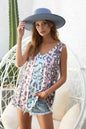 Mint pink and mocha sleeveless jersey knit top with leopard print and color blocking by Trendsi.