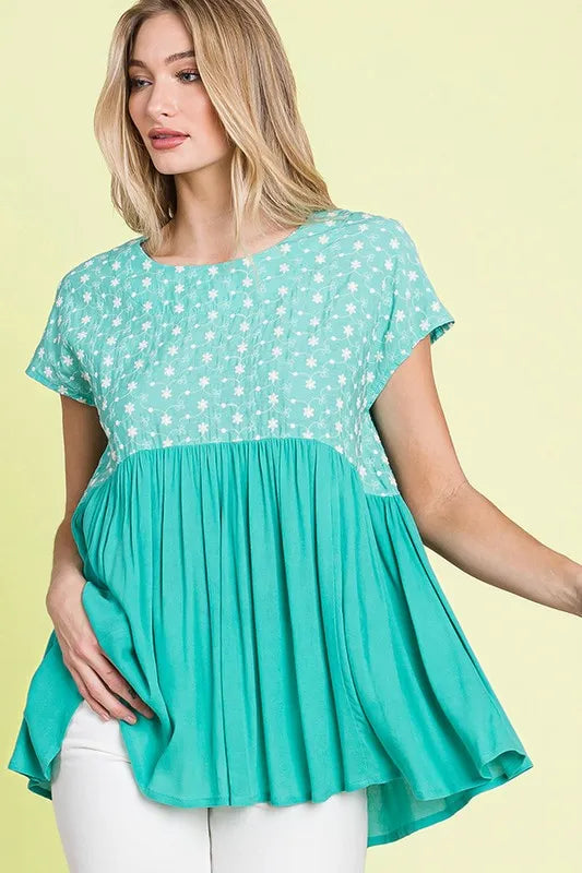 Plus size Lime 'N' Chili embroidered short sleeve pleated babydoll top with vibrant green color and feminine design.