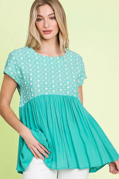 Plus size lime and chili embroidered short sleeve babydoll top with pleated design, from Trendsi.