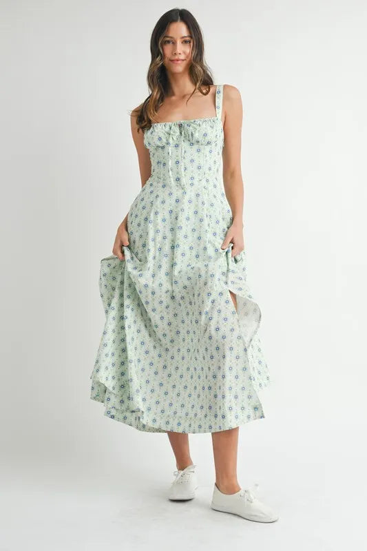 Mint floral print bustier midi dress with back lace-up detail by Trendsi, showcasing a fitted silhouette and elegant design.