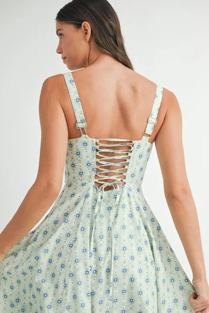 Mint floral print bustier midi dress with back lace-up detail by Trendsi, showcasing a fitted bodice and flowy skirt.