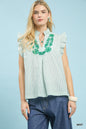 Mint green Umgee embroidered ruffle sleeve popover top with floral embroidery and lightweight fabric, stylish and casual.