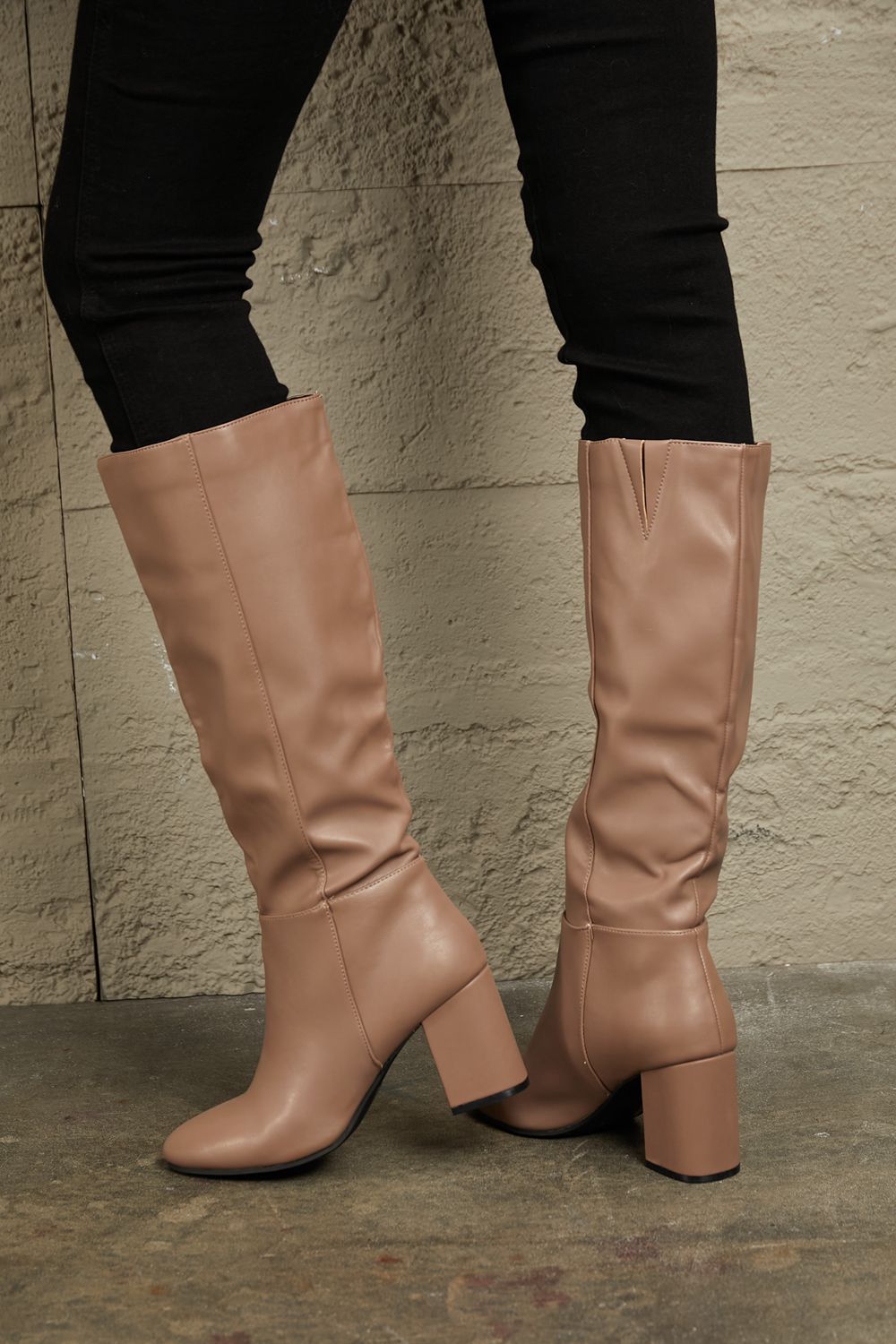 Mocha knee-high boots by East Lion Corp with block heels, stylish and versatile footwear from Trendsi.