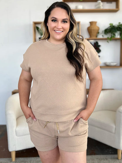 Trendsi mocha double take full-size textured short sleeve T-shirt and drawstring shorts set on a model.