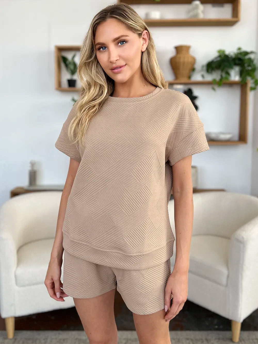 Mocha Trendsi Double Take full-size textured short sleeve T-shirt and drawstring shorts set on a model.