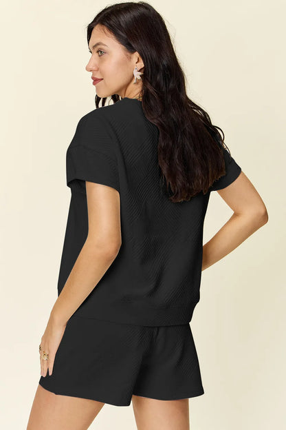 Trendsi mocha double take full-size textured short sleeve t-shirt with matching drawstring shorts set on a model.