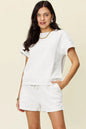 Trendsi mocha double take full size textured short sleeve T-shirt and drawstring shorts set on a model.