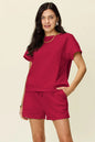 Trendi mocha double take full-size textured short sleeve T-shirt with matching drawstring shorts set for women.